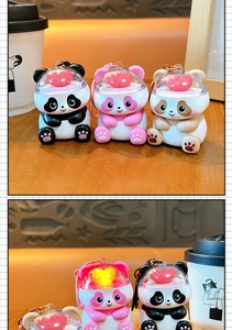 Detail showing the glowing heart effect on cute panda keychains in multiple colors