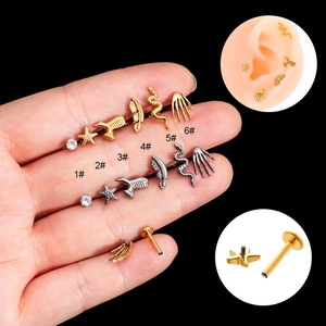 Piercings labret de titanio G23 con dijes de estrella de mar y pluma para cartílago