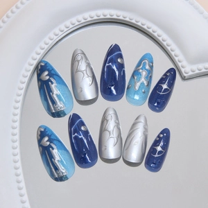 Blue and silver 3D line cat-eye starry ocean press-on nails in long stiletto shape