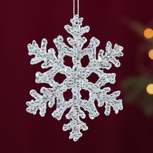 Transparent acrylic snowflake ornament with colorful glitter and silver hanging string