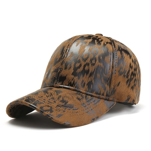 Stylish leopard print baseball cap with glossy leather texture and curved brim for women