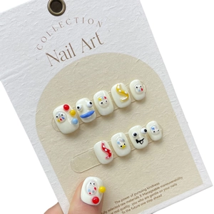 Handmade 3D pop art press-on nails with quirky eye designs and colorful polka dots