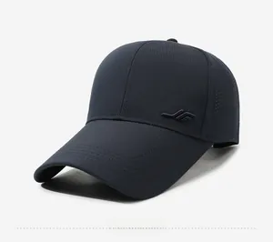 Detail view of navy blue baseball cap showing laser-cut side vents and textured fabric