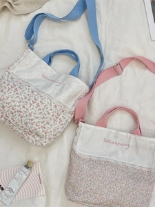 Floral patchwork canvas tote bag with lace trim and adjustable crossbody strap