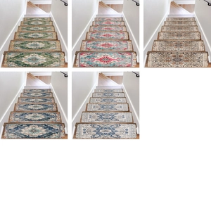 Detail view of anti-slip stair tread mats in various vintage Persian patterns and colors