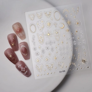 Golden sun and moon bohemian nail stickers with embossed celestial patterns and star motifs