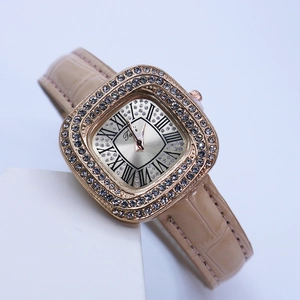 Elegant women's square wristwatch with diamond bezel and beige crocodile leather strap