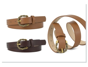Close-up of brown PU leather belts with woven texture metal buckles in studio lighting