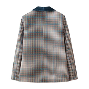 Detailed back view of houndstooth wool blazer with luxury velvet collar stitching