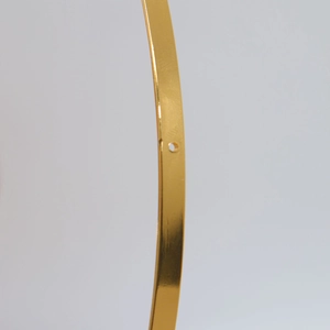Golden polished metal DIY collar accessory with smooth finish and pre-drilled hole