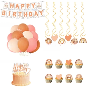 Detail of boho rainbow party set featuring happy birthday banner, balloons, and cake toppers