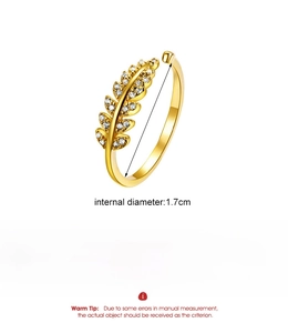 Detail view of gold leaf ring with cubic zirconia including size and weight specs