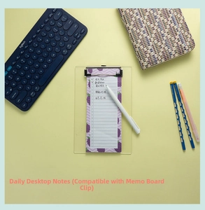 Flat lay of magnetic acrylic clipboard with floral to-do list and minimalist white pen