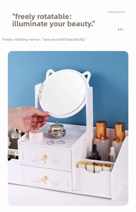 White vanity organizer with two drawers and a rotating cat-ear round makeup mirror
