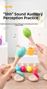 Detailed close-up of a child holding colorful wooden maracas for sensory musical play