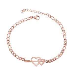 Detail of rose gold Figaro chain bracelet featuring a double heart with arrow design