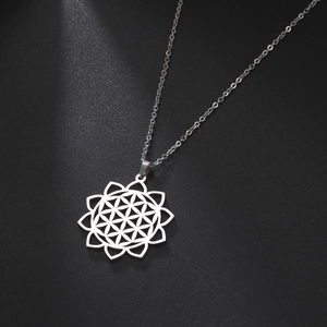 Close-up of a silver hollow geometric flower pendant necklace with high metal luster