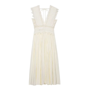 Elegante abito lungo in pizzo bianco avorio con scollo a V profondo e senza maniche