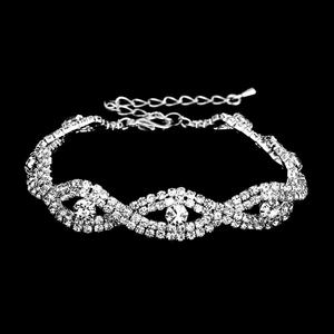 Elegant bridal necklace set with silver rhinestones featuring a teardrop pendant and lobster clasp