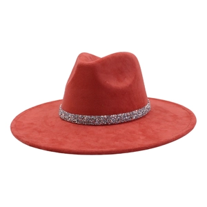 Detail of red faux suede fedora hat with sparkling silver rhinestone band decoration