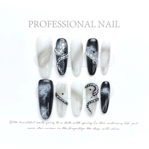 Press-on nails with 3D snakes and black ink smoke design on long almond shape