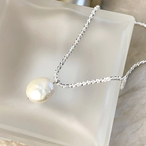 Sparkling S925 sterling silver chain with a natural baroque pearl pendant for women