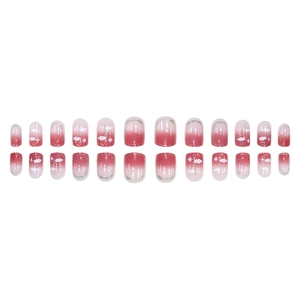 Short square press-on nails with pink gradient, white clouds, stars, and silver glitter