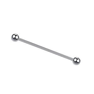Macro shot of silver titanium steel barbell tongue ring with polished screw balls