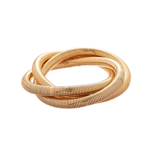 Minimalist gold metal layered spiral cuff bracelet with a thick geometric swirl design