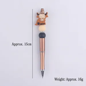 Creative beaded ballpoint pen featuring a cute silicone highland cow charm and pearls