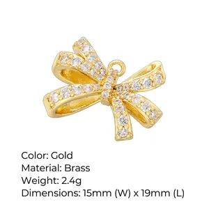 Elegant gold bow pendant inlaid with sparkling white zircon for delicate necklaces