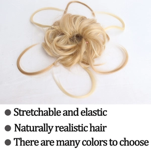 Messy bun hair piece with elastic band in light blonde, showing natural hair texture