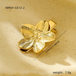 Detailed view of gold flower hair clip with size 3.66cm and weight 7.9g specifications