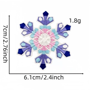 Detail view of 7cm snowflake embroidery patch with precise needlework and vibrant multi-color threads