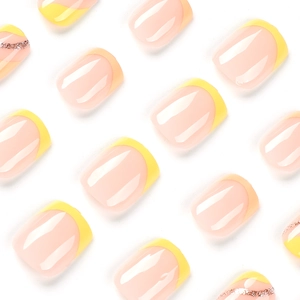 Short square yellow French line press-on nails with pink glitter on nude base