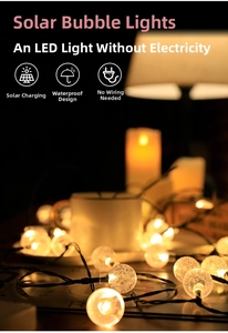 Close-up of solar-powered LED bubble ball string lights with warm yellow waterproof glow