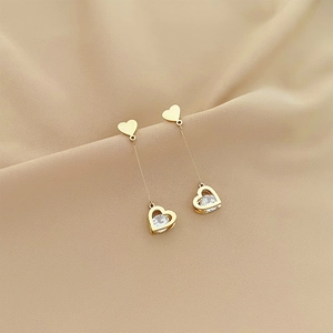 Elegant gold titanium steel long tassel earrings with heart pendants and sparkling crystals