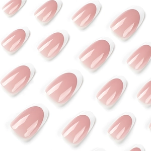 Elegant almond-shaped French press-on nail set with nude pink base and white tips