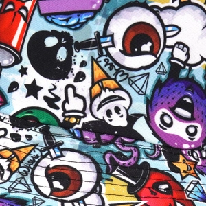 Macro shot of colorful cartoon graffiti print and multi-needle stitching on fisherman hat