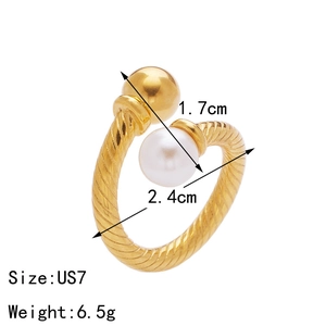 Twisted stainless steel open ring with white pearl and gold ball, size US7 shown
