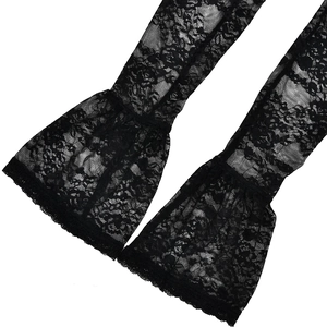 Detail of sheer black lace sleeves with elegant floral patterns and flared cuffs