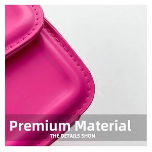 Macro shot of rose pink shoulder bag showing high-quality leather texture and precise stitching