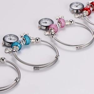 Adjustable stainless steel beaded bracelet watch with swan and heart charms in multiple colors