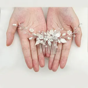 Elegant bridal hair comb with silver leaves, white pearls and sparkling crystals