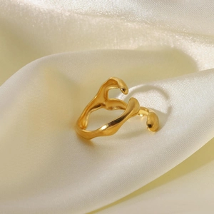 18K gold-plated irregular wave-shaped stainless steel open ring on silk fabric