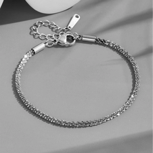 Minimalist silver popcorn chain bracelet in stainless steel with elegant plant shadows