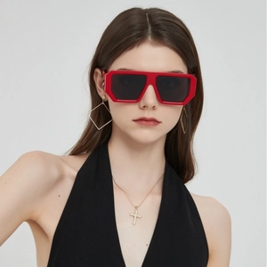 Oversized square red sunglasses for women with thick frames and dark lenses for fashion