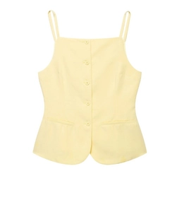 Detail of yellow button-up vest featuring a square neck and symmetrical pockets