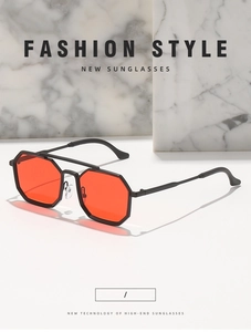 Detail of steampunk double-bridge sunglasses with orange lenses and black polygon frame