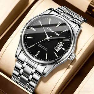Detail view of the silver stainless steel watch strap and black dial in a gift box
